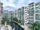 Modern apartment complex with large outdoor pool