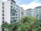 Modern apartment buildings with green landscaping