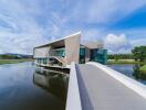 Modern building with unique architectural design over water