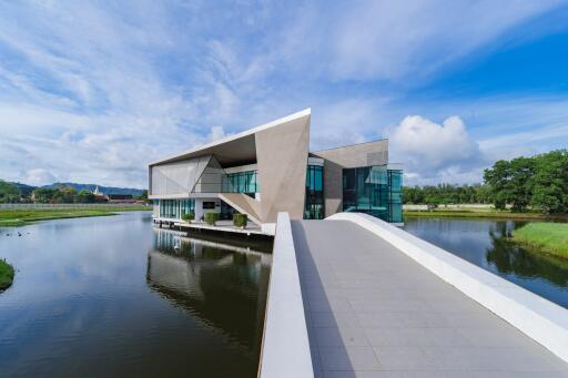 Modern building with unique architectural design over water