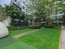 Modern apartment buildings with landscaped garden area