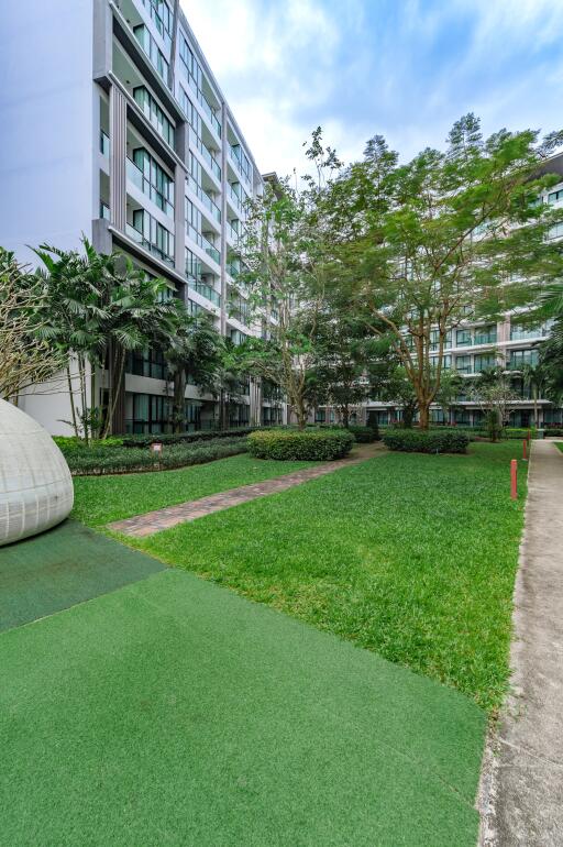 Modern apartment buildings with landscaped garden area