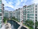 Exterior view of modern residential complex with a swimming pool