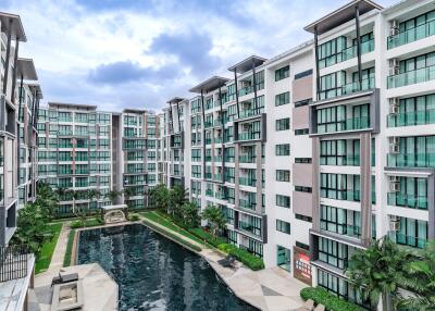 Modern apartment complex with swimming pool