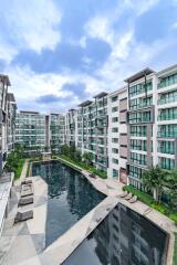 Modern apartment complex with swimming pool