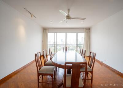 Dining room with wooden table and chairs