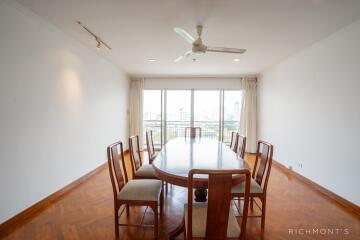 Dining room with wooden table and chairs