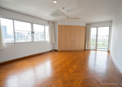 Spacious living room with large windows