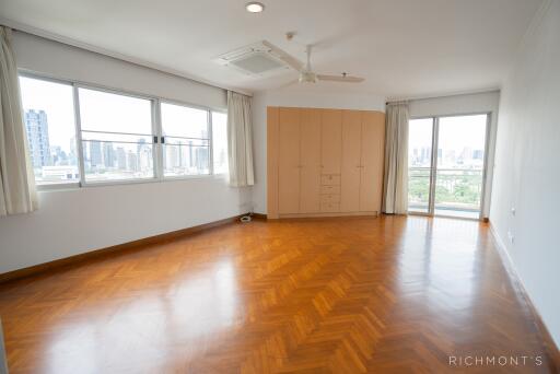 Spacious living room with large windows