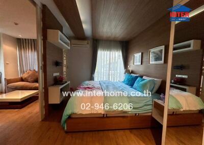 Cozy bedroom with modern decor and double bed