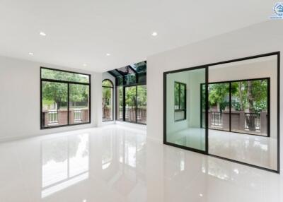 Spacious modern living room with large windows