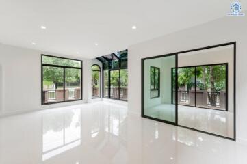 Spacious modern living room with large windows