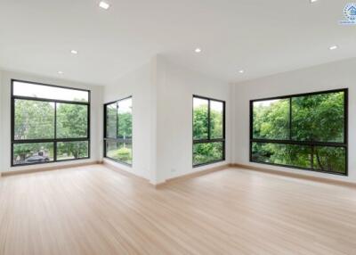 Spacious living room with large windows