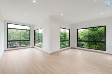 Spacious living room with large windows