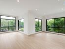 Spacious living room with large windows