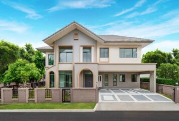 Front view of a modern two-story house with attached garage