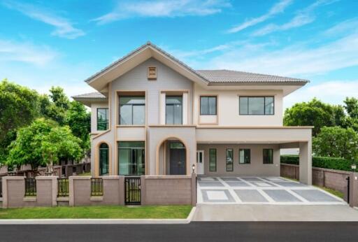 Front view of a modern two-story house with attached garage