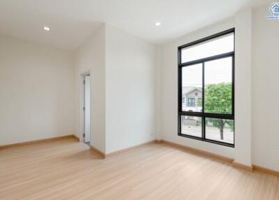 Spacious living room with large windows