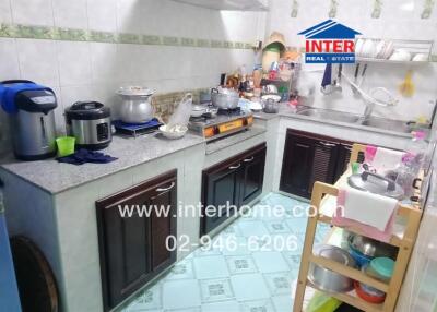 A well-organized kitchen with modern appliances and ample counter space