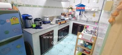 A well-organized kitchen with modern appliances and ample counter space