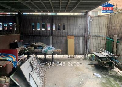 Garage with miscellaneous items and storage