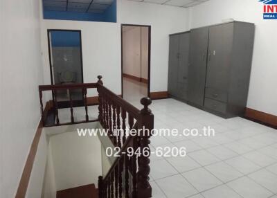 Bedroom with wardrobe and stairs