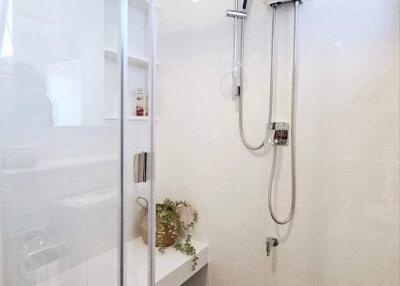 Modern bathroom with glass shower enclosure