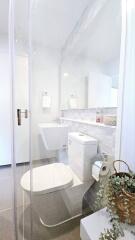 Modern bathroom with white fixtures