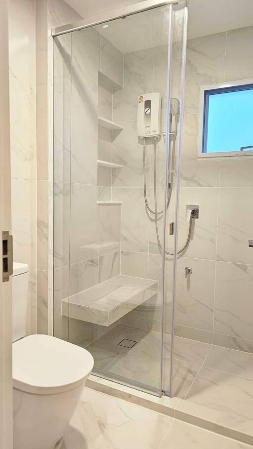 Modern bathroom with glass shower door