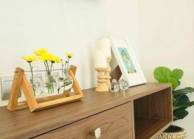 modern living room with wooden console and decor items