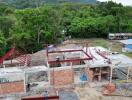 Construction of a building surrounded by greenery