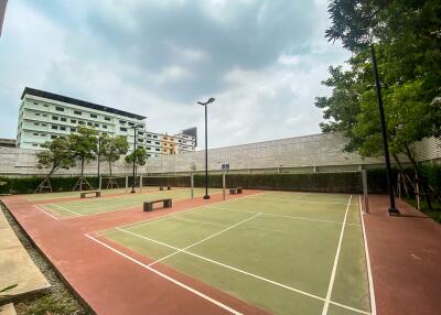 Outdoor tennis or sports courts in a residential complex