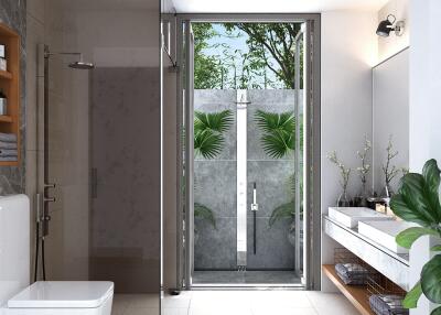 Modern bathroom with glass shower door and natural light