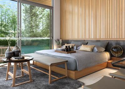 Spacious bedroom with modern decor and large windows