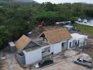 Under-construction house with surrounding area