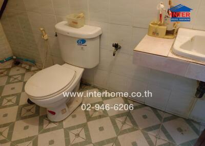 Bathroom with toilet and sink