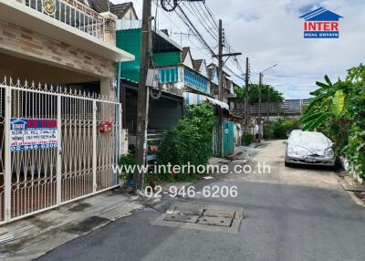 Front view of residential building and street