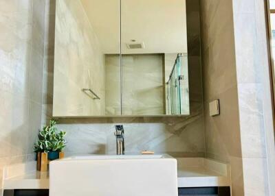 Modern bathroom with large mirror and sink