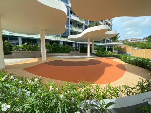 Outdoor recreational area in front of a modern building