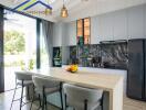 Modern kitchen with island and elegant lighting