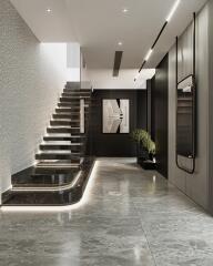 Modern building lobby with marble flooring and illuminated staircase