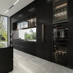 Modern kitchen with black cabinetry and wine cooler