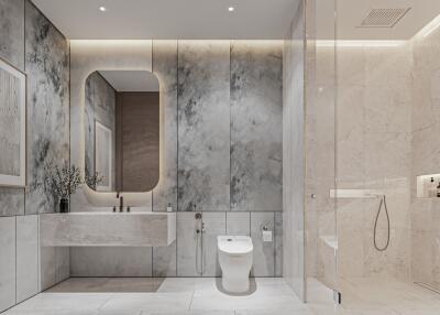 Modern bathroom with marble walls and glass shower