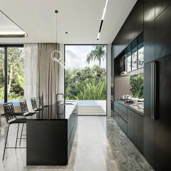 Modern kitchen with island and outdoor views