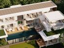 Aerial view of a modern multi-storey house with pool