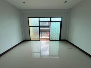 Spacious living room with large windows