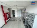 Apartment building hallway with mailboxes