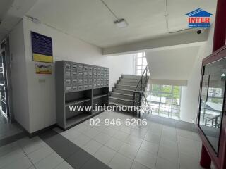 Staircase and mailboxes in building common area