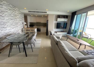 Modern living room with dining area and kitchen