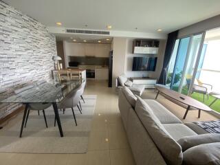 Modern living room with dining area and kitchen